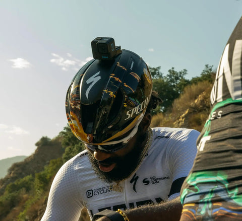 Cyclist with Premium Flat And Curved Surface Action Camera Mounts Featuring Industrial Strength Adhesive on helmet outdoors.