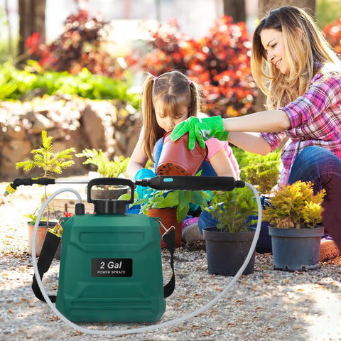 Battery Powered Garden Sprayer 2 Gallon With USB Rechargeable Handle used by woman and child in garden with plants