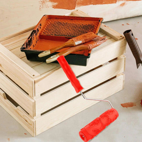 Professional Grade Slick Wood Grain Texture Paint Roller For Interior Wall Decoration on a wooden crate with paint tools.