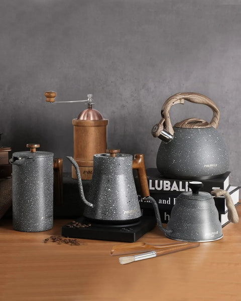 2.7 Quart Tea Kettle with Natural Stone Finish and Wood Pattern Handle, Loud Whistle, Food Grade Stainless Steel Teapot on table