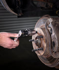 Durable Universal Stud Extractor For Damaged Bolts And Broken Studs, Fits 1/4 To 1/2 Inch Studs, Works On Rusted Bolts, in use on car brake