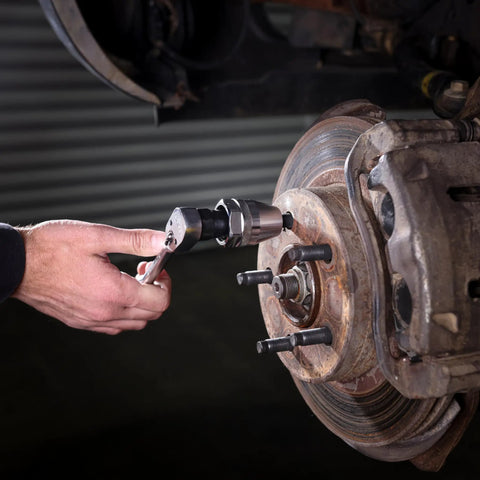 Durable Universal Stud Extractor For Damaged Bolts And Broken Studs, Fits 1/4 To 1/2 Inch Studs, Works On Rusted Bolts, in use on car brake