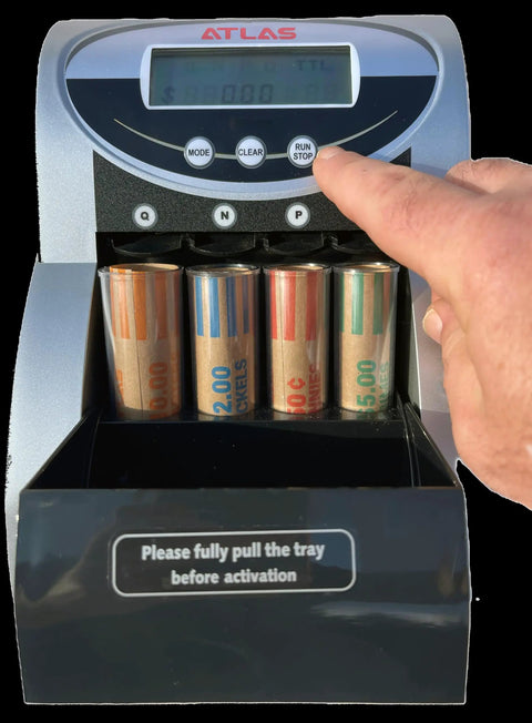 Automatic Coin Counter And Sorter With Digital Display For Loose Change Processing features user adjusting settings on the control panel.