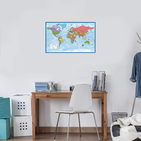 Durable Laminated World Map And US Map Poster Set 18 By 29 Inches Wall Chart Maps Of The World And United States Made In The USA Tear Resistant 3 Mil Lamination Must-Have For Classrooms Home Office Or Study Space displayed in an office setting above a desk.