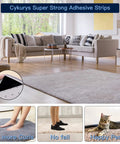 Living room with grey rug secured by 14 Piece Non Slip Rug Tape Set With Rug Grippers And Pad Grippers For Hardwood Floors Tile And Mats, Black