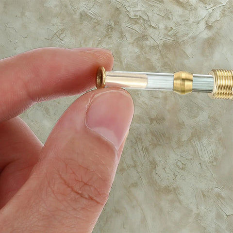 Brass compression sleeve and insert for 1/4 inch ID tubing (4 mm OD); clear tube with threaded brass nut