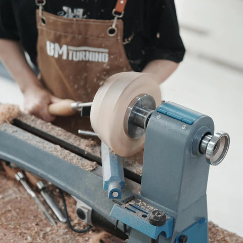 Craftsman using No Nonsense Heavy Duty 4 Inch Steel Wood Lathe Faceplate With 1x8TPI Spindle for woodturning.