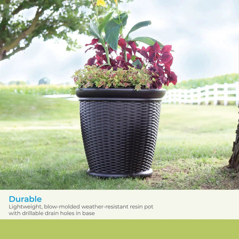 18 Inch Resin Wicker Planter For Indoor And Outdoor Use All American Style Durable Plastic Construction With Moisture Retention Brown Finish Weather Resistant Made In USA placed on grass with plants inside