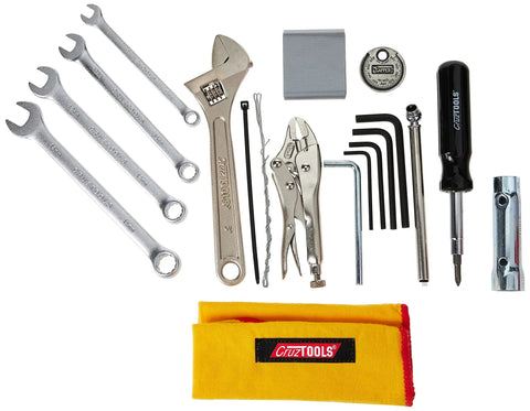 Six In One EconoKIT M1 Tool Kit for Japanese Metric Motorcycles ATVs and UTVs with wrenches, pliers, screwdriver, and pouch.
