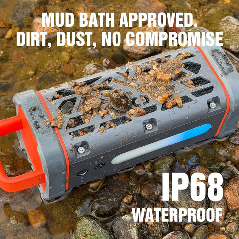 Rugged Aluminum Bluetooth Speaker With 45W Power, BassUp Enhanced Bass, IP68 Waterproof Outdoor Wireless Speaker in mud