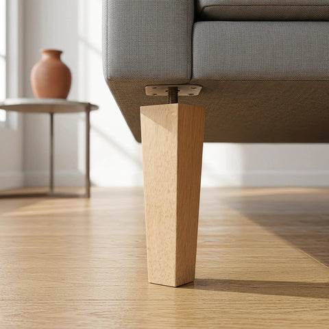 Close-up of Solid Wood Sofa Legs 6.7 Inches with Screws, showing sturdy wooden leg attached to couch base on wooden floor.
