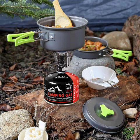 Isobutane Camping Stove Fuel Canister 230 Gram Butane Propane Blend Lightweight Gas Canister For Backpacking 4 Pack in use outdoors
