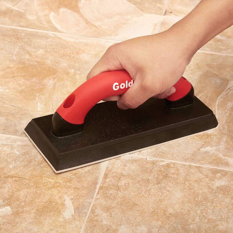 4 Inch By 12 Inch Grout Float For Tile With Molded Rubber Pad And Soft Grip Handle in use on tile floor