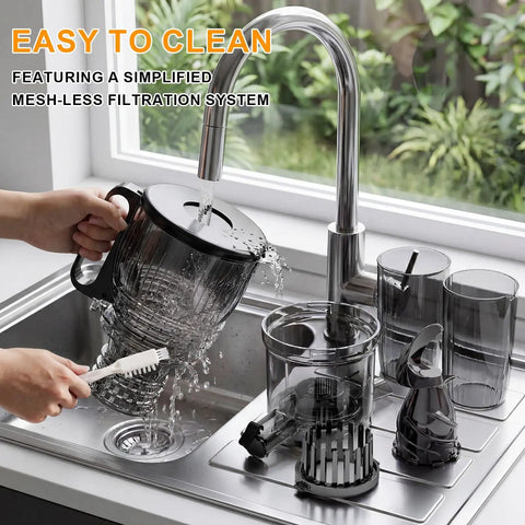 Kiamith 300W Cold Press Juicer With Huge 5.8 Inch Wide Feed Chute being cleaned at sink with water running.