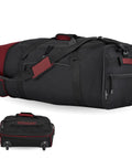 Travelers Club 32-inch expandable rolling duffel bag, red and black, by Amazon, side view with wheels