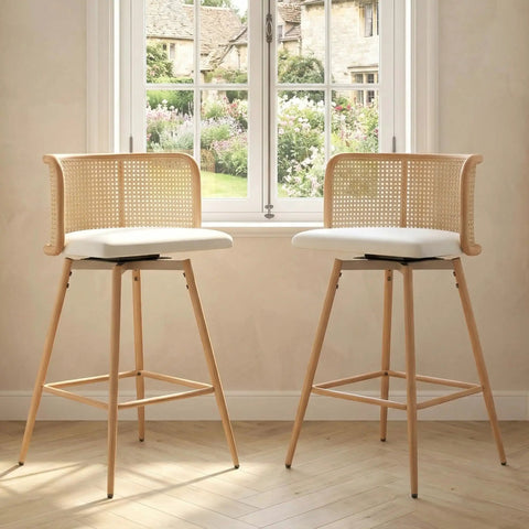 Set Of 4 Swivel Rattan Bar Stools, 26 Inch Counter Height With Natural Woven Back And White Faux Leather Seats in bright kitchen