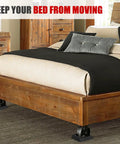 Anti Slip Bed And Furniture Wheel Stoppers 4 Pack Stay Put On Hardwood Floors installed on bed protecting floor from movement