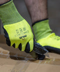 Person wearing Heavy Duty Industrial Work Gloves With ANSI Cut Level A5 Protection Tough As Nails Grip Touchscreen Compatible