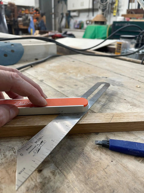 Using 9 Inch Savage T Bevel with stainless steel rule for precise angle measurement on wood