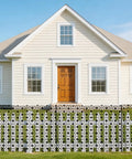 Front view of house with 24 Inch High Outdoor Garden Fence Border Edging Roll Made From HDPE With UV Anti Aging Finish Keeps Rabbits And Small Pests Out No Dig Fencing For Easy Install Weatherproof Backyard Yard Patio Decor installed.