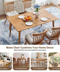Ultra Plush Dining Chair Cushions Set Of 4 3.5 Inch Thick With Ties Non Slip Backing 15.5 By 15.5 Inches Beige Memory Foam Comfort For Kitchen Dining Room Bar Patio displayed on wooden chairs around a dining table.