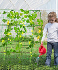 Girl watering plants on a Cucumber Trellis for Raised Garden Bed, Rustproof Metal Garden Arch Trellis for Climbing Plants Support, Adjustable Width 16 to 26 Inches, 48x48 Inch Outdoor Green