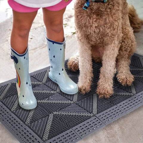 Heavy Duty Outdoor Rubber Doormat With Interlocking Tiles Waterproof And Easy Clean DIY Assembly 47 Inch By 29 Inch Entrance Mat with child and dog