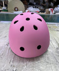 Pink adjustable kids helmet for skating, biking, cycling, and skateboarding, ABS shell with vents, part of protective set