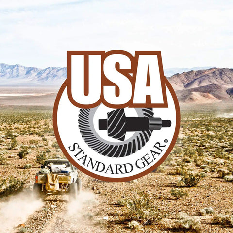 USA Standard Gear logo over desert landscape with off-road vehicle, promoting Diff Master Overhaul Kit With Koyo Bearings For 1999 To 2008 GM 8.6 Inch Differential.
