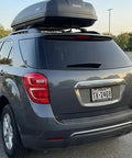 Clear Gray License Plate Frames With Anti Glare Vision Built Tough ABS Rustproof 2 Pack Front And Rear Plate Covers visible on parked SUV