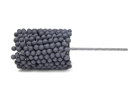 Close-up of FLEX-HONE Deburring And Finishing Tool Pro Grade 4 1/4 Inch Diameter 240 Grit Silicon Carbide with abrasive beads.