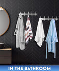 Sturdy Stainless Steel Wall Mount Coat Rack Set With Heavy Duty Hooks For Hats Towels Robes Jackets And Clothes Two Pack For Entryway Or Bathroom Sleek Modern Hanger That Keeps Mess In Check installed in a bathroom.