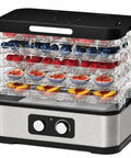 No Sweat Compact Food Dehydrator For Crafting Homemade Beef Jerky Crispy Banana Chips Dried Oregano Leaves And Handcrafted Puppy Bites with various fresh fruits.