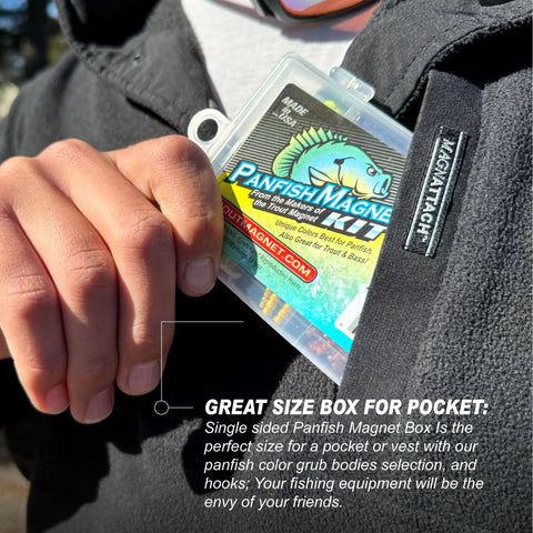 Person placing Panfish Magnet Kit With Longer Shad Dart Hook, 82 Piece Lure Set in pocket, showing compact size.