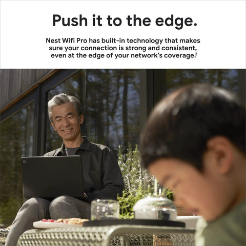Man using laptop outdoors with child, demonstrating WiFi Pro Mesh Router With WiFi 6E Speed Ultra Fast Rock Solid Connection For Entire