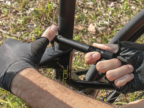 Cyclist using Pro Grade Adjustable Torque Kit 2 To 10 Nm With 9 Bit Set on bike seat adjustments