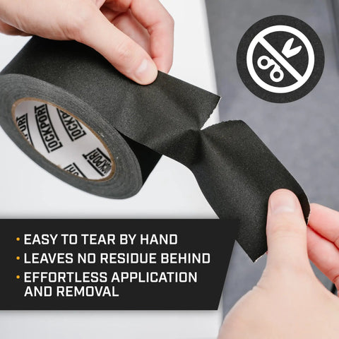 Close-up of Black Gaffers Tape 2 Inch By 30 Yards 3 Pack Pro Gaff Tape, easy tear, no residue, water-resistant, held in hands.