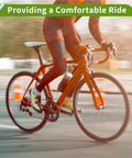 Cyclist on road bike showcasing Universal 28.6x200mm Black Bike Seat Post Durable Steel Saddle Post For Road Mountain And City Bikes