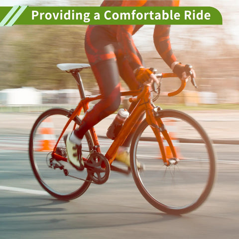 Cyclist on road bike showcasing Universal 28.6x200mm Black Bike Seat Post Durable Steel Saddle Post For Road Mountain And City Bikes