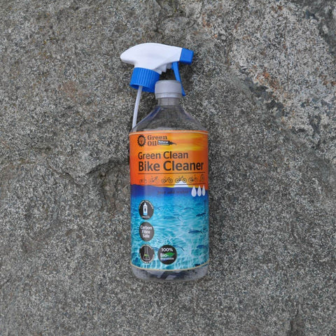 Green Clean Bike Cleaner spray bottle on stone background, part of Trail Ready Eco Friendly Bike Care Bundle With Wet Bike Chain Lube 100 ml, Degreaser Jelly 100 ml, Green Clean 300 ml, Biodegradable And Natural Formula, Palm Oil Free And Petroleum Free, Made In UK.