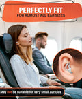 Woman using Reusable Sleep Ear Plugs With 40 dB Noise Reduction For Sleeping on a plane, detail of earplug fit