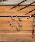 Top Notch 12-Piece Mini Stainless Steel Extension Springs Kit With Secure Hooks And Wire Pulling Clips For Quick Graphic Swaps On Display Boards Perfect For Shop Repairs And Tough Industrial Jobs With Durable Galvanized Metal For Maximum Stability, five springs on wood