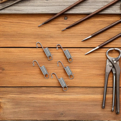 Top Notch 12-Piece Mini Stainless Steel Extension Springs Kit With Secure Hooks And Wire Pulling Clips For Quick Graphic Swaps On Display Boards Perfect For Shop Repairs And Tough Industrial Jobs With Durable Galvanized Metal For Maximum Stability, five springs on wood