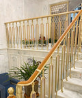 Gold Aluminum Stair Balusters With Tempered Glass Sleek Deck Post Railing No Sweat Install Staircase Rail Replacement 10 Pack 33 5 Inch stylishly installed in modern staircase.