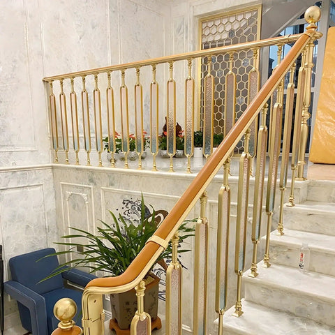 Gold Aluminum Stair Balusters With Tempered Glass Sleek Deck Post Railing No Sweat Install Staircase Rail Replacement 10 Pack 33 5 Inch stylishly installed in modern staircase.