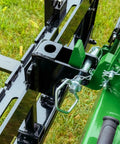 Close-up of Dual Mount Tractor Pallet Forks For Front End Loader And 3 Point Hitch With 2 Inch Receiver Chain Hooks Weight Rack