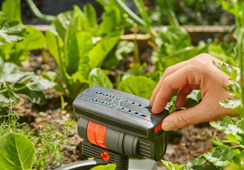Adjusting settings on ZoomMaxx Adjustable Oscillating Sprinkler On Metal Step Spike For Even Watering Of Large Lawns Up To 2300 Sq Ft