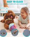 Young girl and dog playing on clean floor mat, labeled easy to clean, odorless, non-toxic