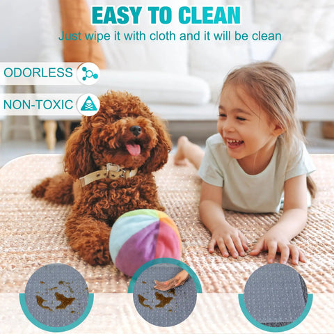 Young girl and dog playing on clean floor mat, labeled easy to clean, odorless, non-toxic