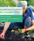 Gardener planting seedlings with Easy To Use Soil Blocker With Comfortable Handle, 4 Cell 2 Inch Block Maker for seed starting.